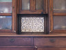 The old dresser decorated with openwork of linden wood 2